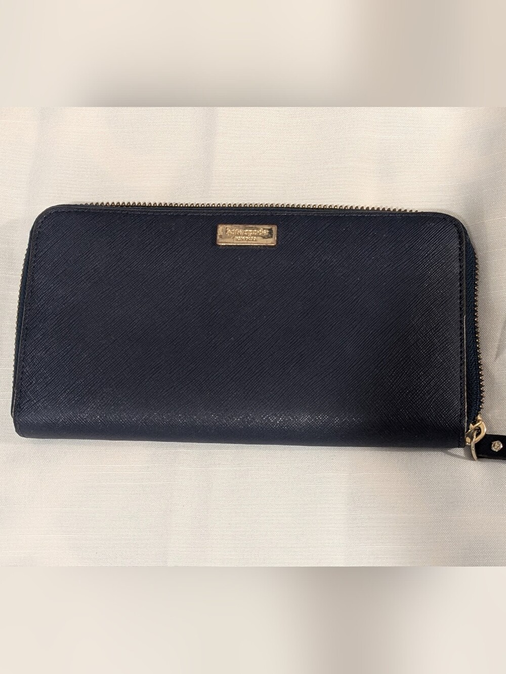 kate spade navy zip-around saffiano wallet with gold plaque